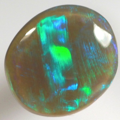 SOLID SEMI BLACK OPAL Large rolling flash of tropical green and blue